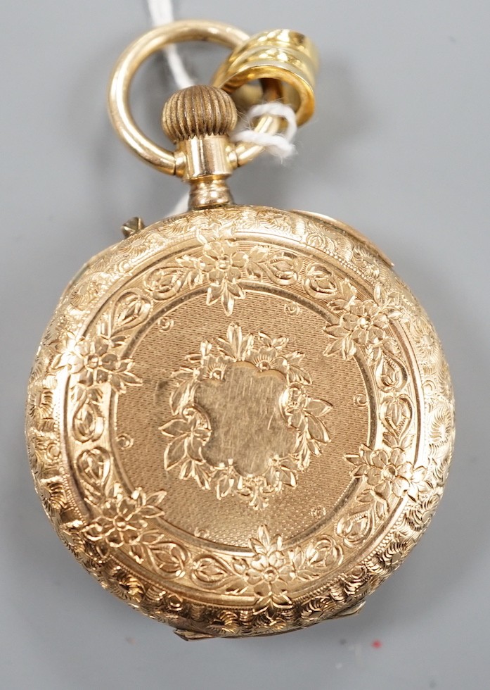 An early 20th century Swiss yellow metal open faced keyless fob watch, with Roman dial and gilt metal cuvette, case diameter 3mm, gross weight 30.7 grams.